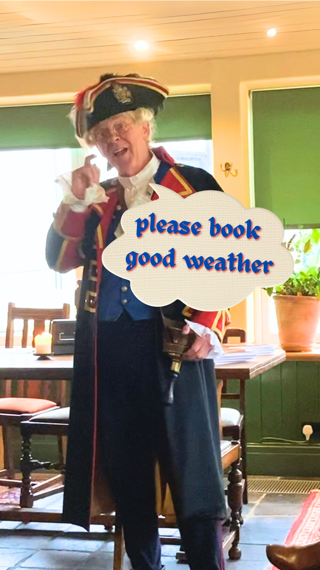 Chester Town Crier in regalia with speech bubble "please book good weather"